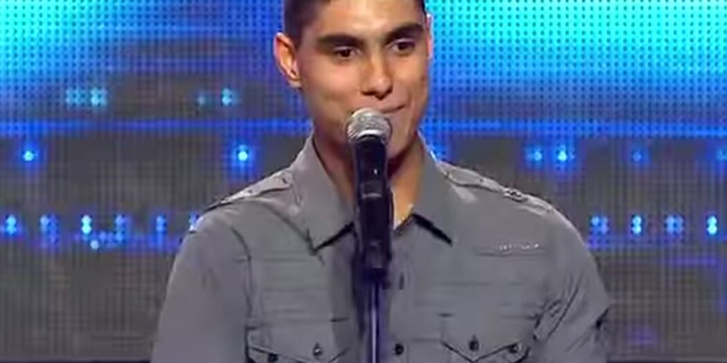 Emmanuel Kelly at the microphone before singing Imagine at his 2011 X Factor Australia audition