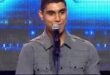 Emmanuel Kelly at the microphone before singing Imagine at his 2011 X Factor Australia audition