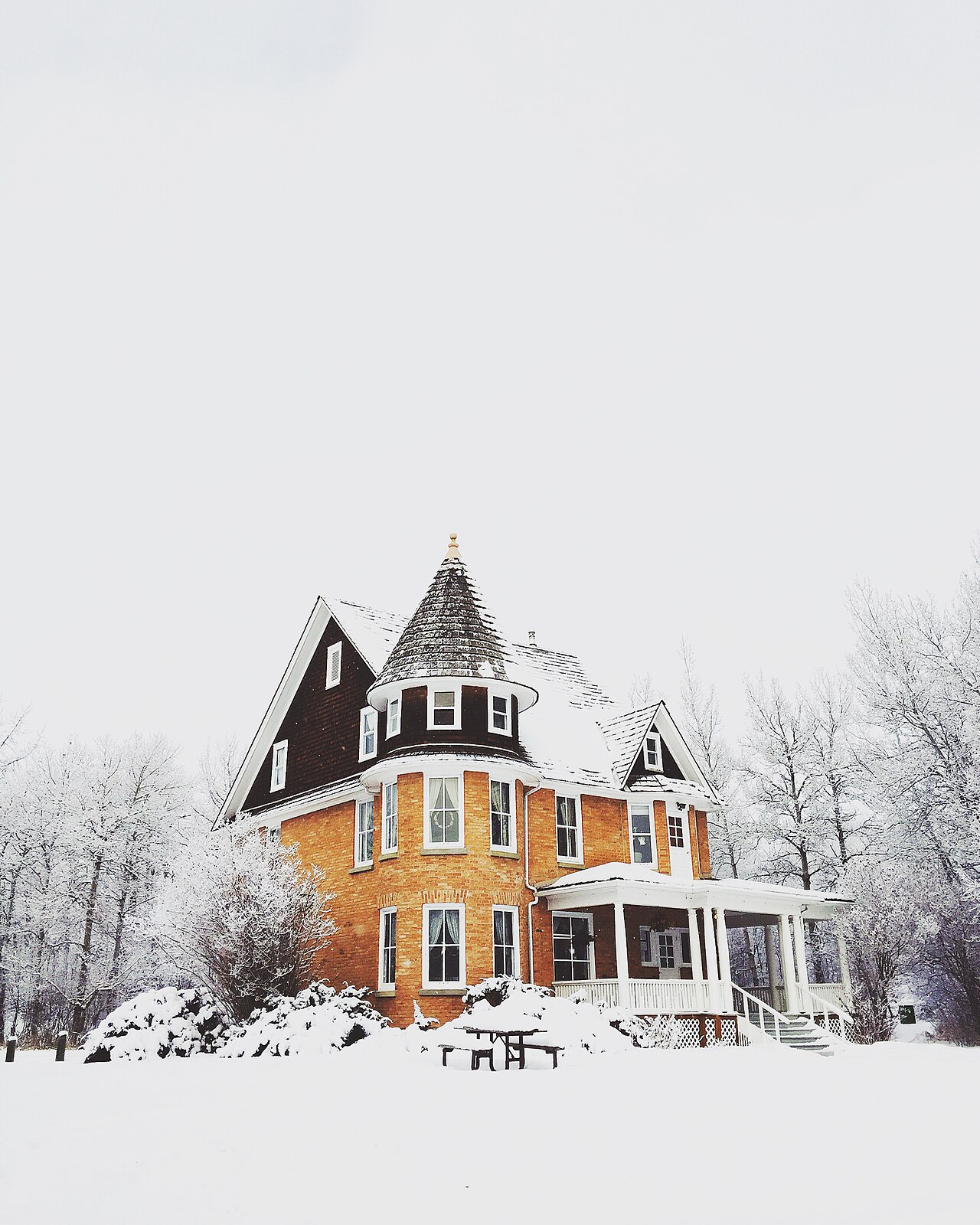 A house covered in fresh snow