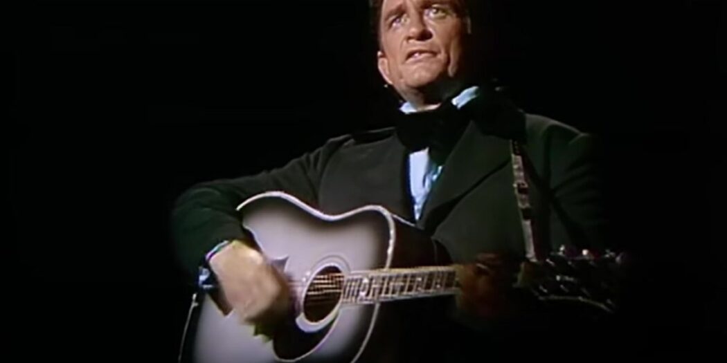 Johnny Cash plays guitar and sings Sunday Mornin Comin Down on The Johnny Cash Show
