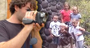 Man watching old family home movies found on a vintage video camera bought on eBay