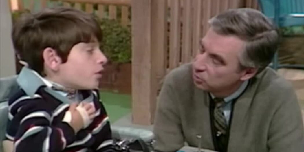 Mister Rogers talks with young Jeff Erlanger in his wheelchair on Mister Rogers' Neighborhood