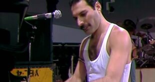 Freddie Mercury of Queen at the piano during Live Aid at Wembley Stadium in 1985