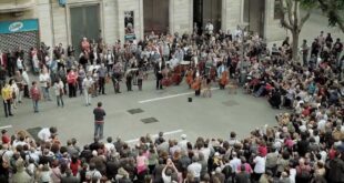 Musicians and singers performing Ode to Joy in a flash mob in Sabadell, Spain