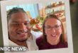 Wanda Dench and Jamal Hinton smiling together at Thanksgiving